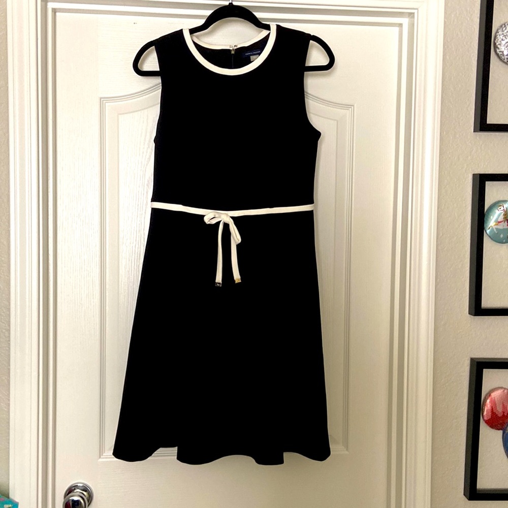 Good condition Tommy Hilfiger dress. Slight wear around the white collar.